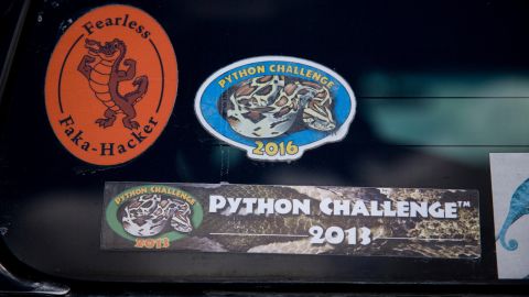 Stickers from previous python hunts adorn the back of Donna Kalil's SUV.