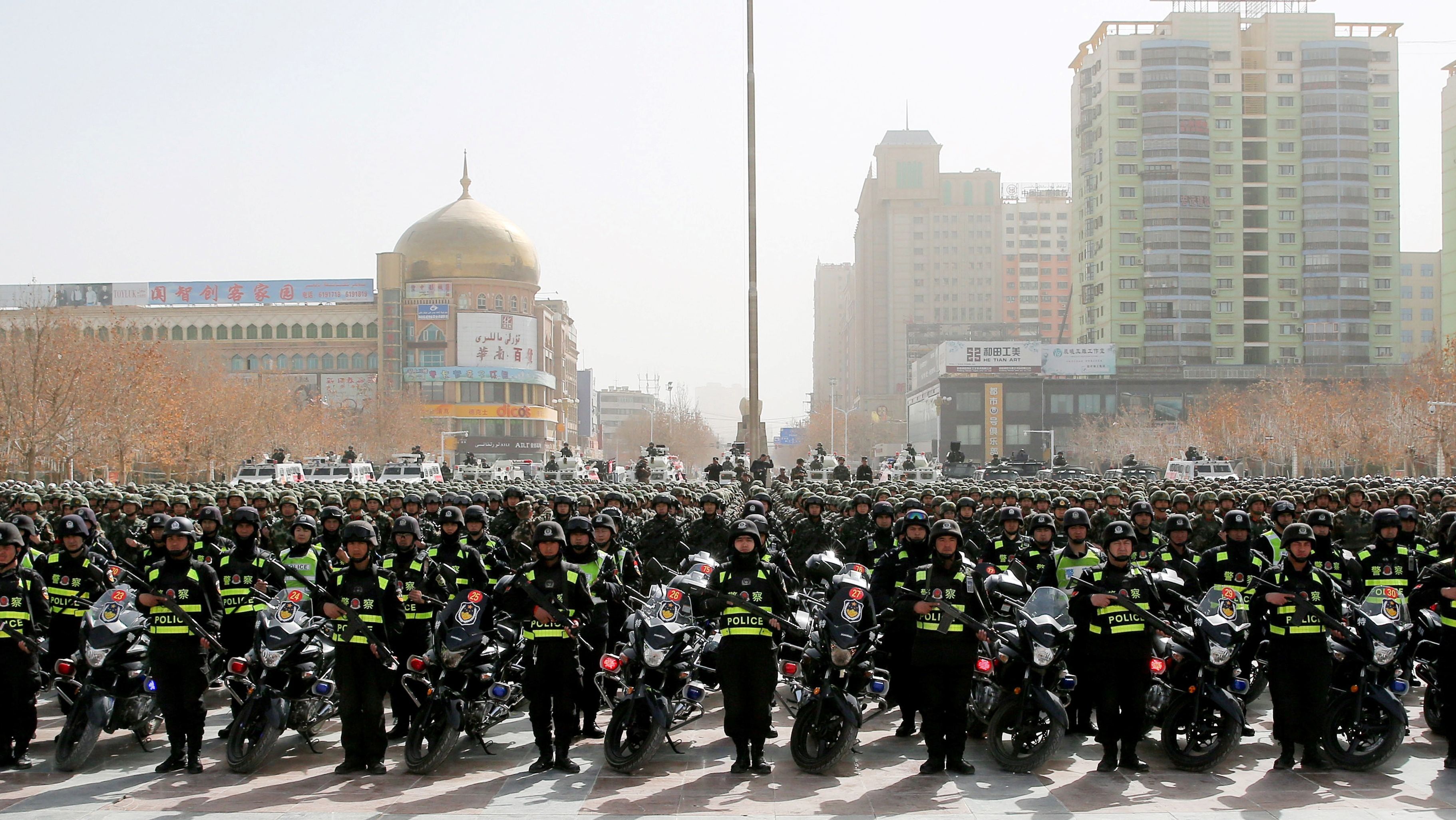 Chinese police make a show of force at a rally in Hetian, Xinjiang, on February 27.