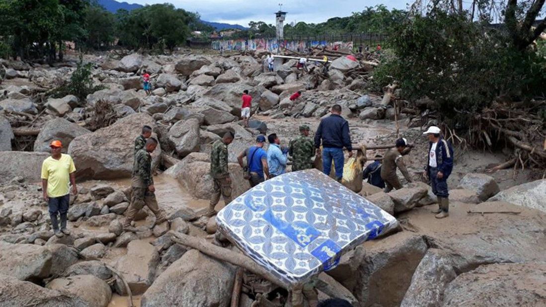 Soldiers and civilians search for survivors in Mocoa. Many residents in the area have been reported missing.