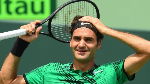 Roger Federer merayakan match point setelah mengalahkan Rafael Nadal di Miami Open.
