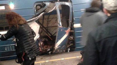The damaged door of a train car is seen after an explosion on the subway in St. Petersburg, Russia, on Monday, April 3. Multiple people were killed in the blast.