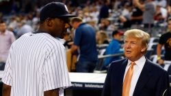 Amar'e Stoudemire of the New York Knicks talks to Donald Trump prior to the game between the New York Yankees and the Tampa Bay Rays on September 23, 2010, at Yankee Stadium.