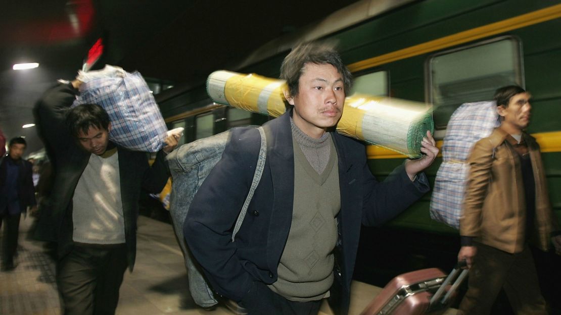 Migrant workers arrive in Chengdu.