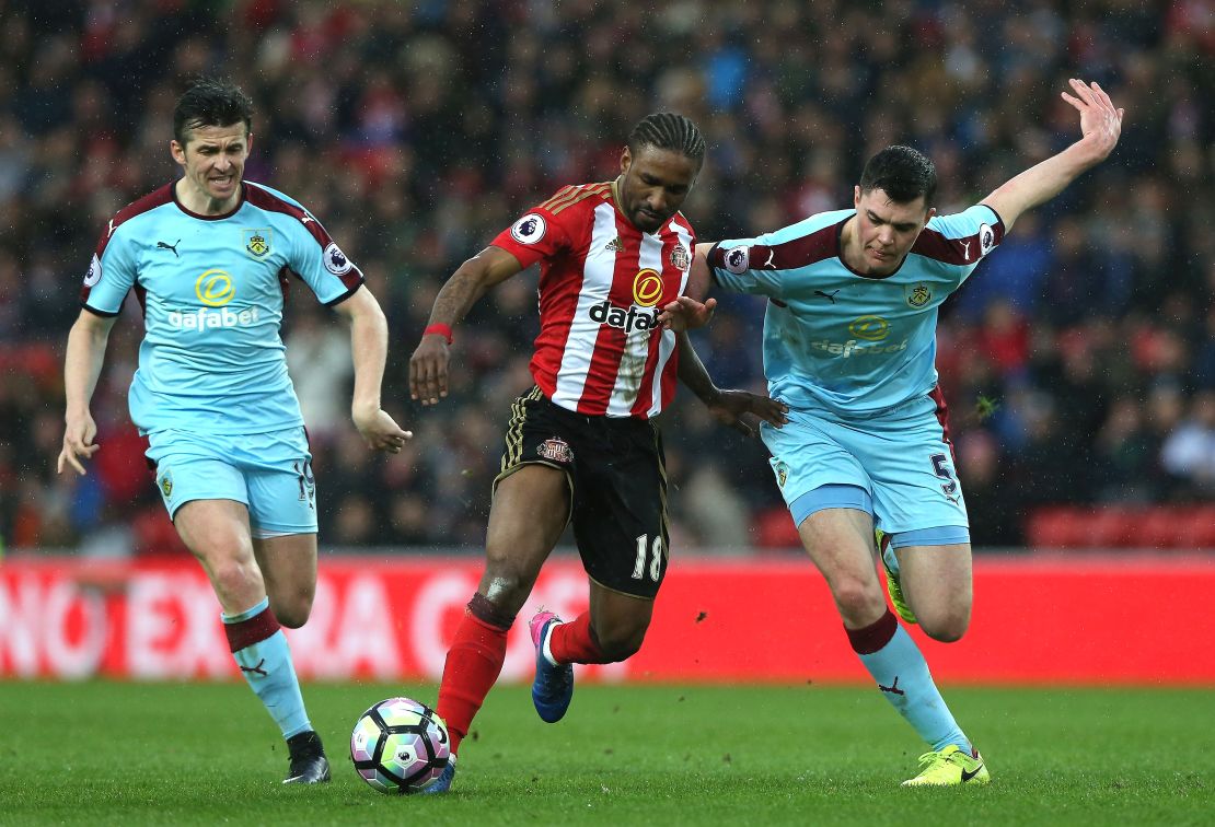 England internationals Jermain Defoe (center) and Michael Keane (right) in action during Sunderland's Premier League clash with Burnley.