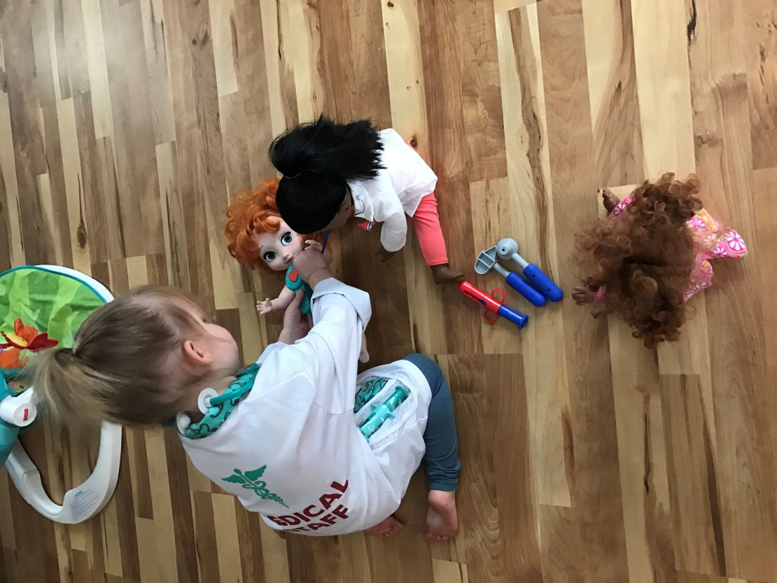 Sophia and her doll give other dolls "checkups."