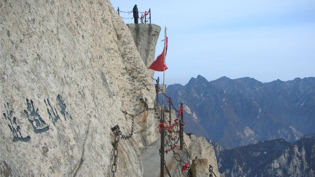 <strong>Hiking horror at Mount Huashan, Shaanxi: </strong>The paths up China's Mount Huashan are genuinely terrifying, consisting of modest foot-grooves cut into a 2,090 meter-high (6,857 feet) sheer rock face. Rusting metal bars serve as makeshift vertical staircases. 