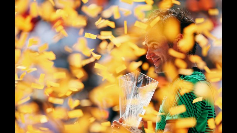 Roger Federer holds his trophy after winning the Miami Open on Sunday, April 2. Federer defeated longtime rival Rafael Nadal in the final.