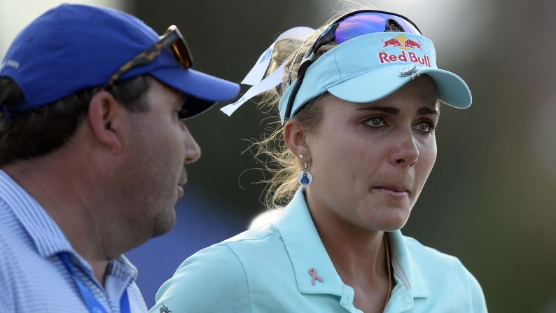 Golfer Lexi Thompson reacts after her playoff loss at the ANA Inspiration on Sunday, April 2. Thompson was visibly shaken after receiving <a href="index.php?page=&url=http%3A%2F%2Fwww.cnn.com%2F2017%2F04%2F03%2Fgolf%2Ftv-viewer-influences-ana-inspiration-lexi-thompson-so-yeon-ryu-four-stroke-penalty%2F" target="_blank">a controversial four-stroke penalty</a> on the 13th hole of the final round. The penalty was assessed for an incorrect ball mark that a television viewer reported from the third round. Thompson was leading by two strokes when she was informed of the penalty. She rallied to force a playoff but came up short to So Yeon Ryu.