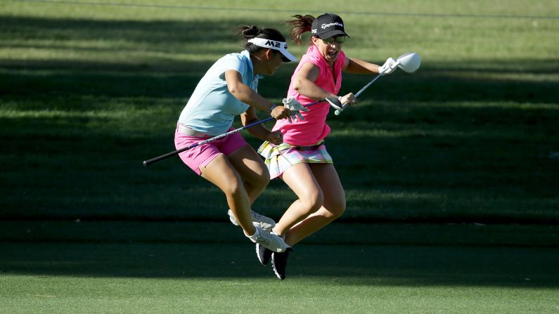 Pro golfer Megan Khang, left, shares a fun moment with amateur Victoria Arlen during a pro-am in Rancho Mirage, California, on Wednesday, March 29.