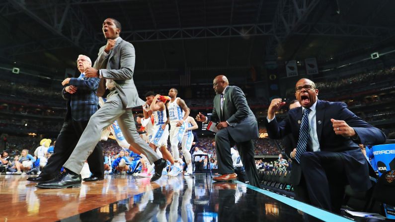 The North Carolina bench reacts to a play in the second half.