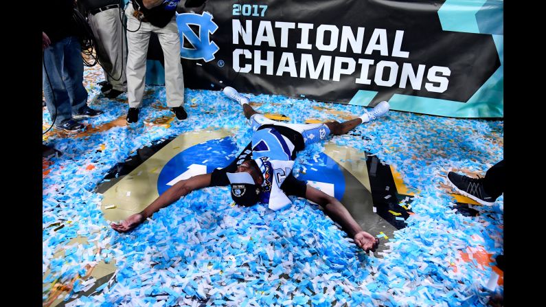 Pinson makes a confetti angel during the celebrations.