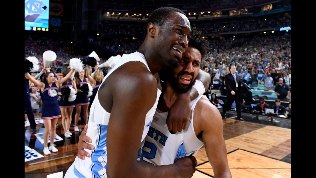 North Carolina's Theo Pinson, left, and Joel Berry II embrace after the NCAA Tournament final on Monday, April 3. North Carolina defeated Gonzaga 71-65 for its sixth national title and first since 2009.