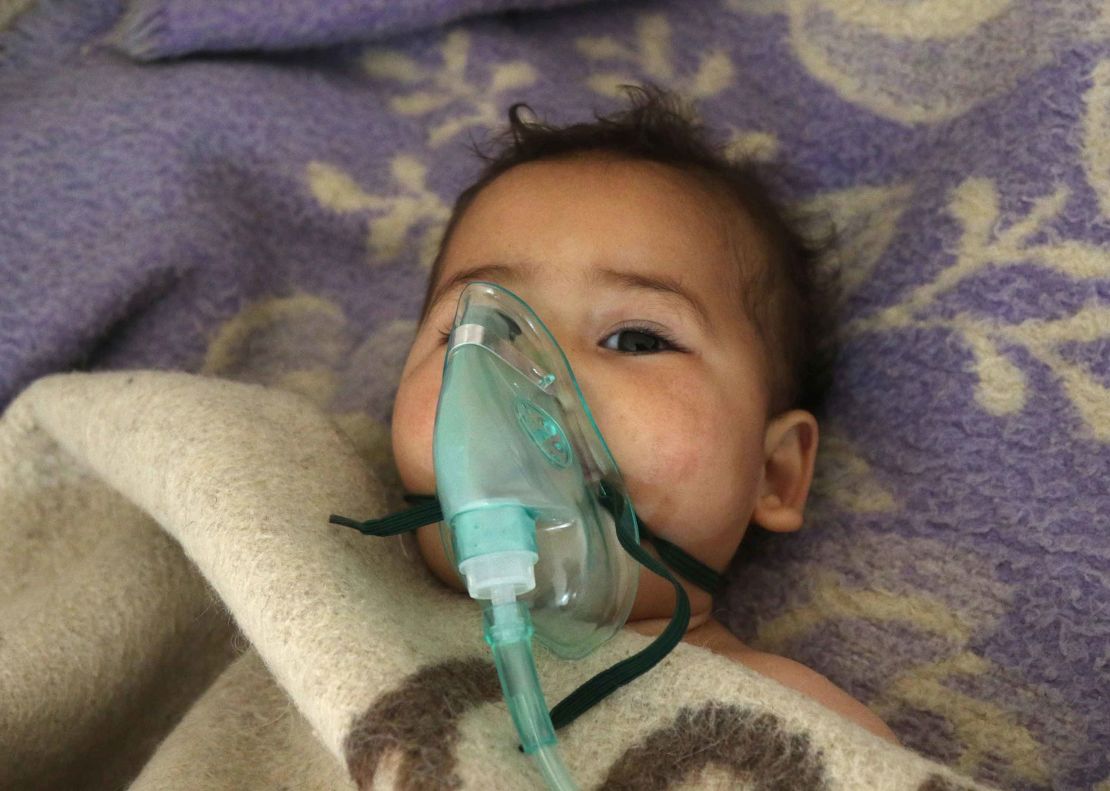 A child receives treatment following the suspected gas attack.