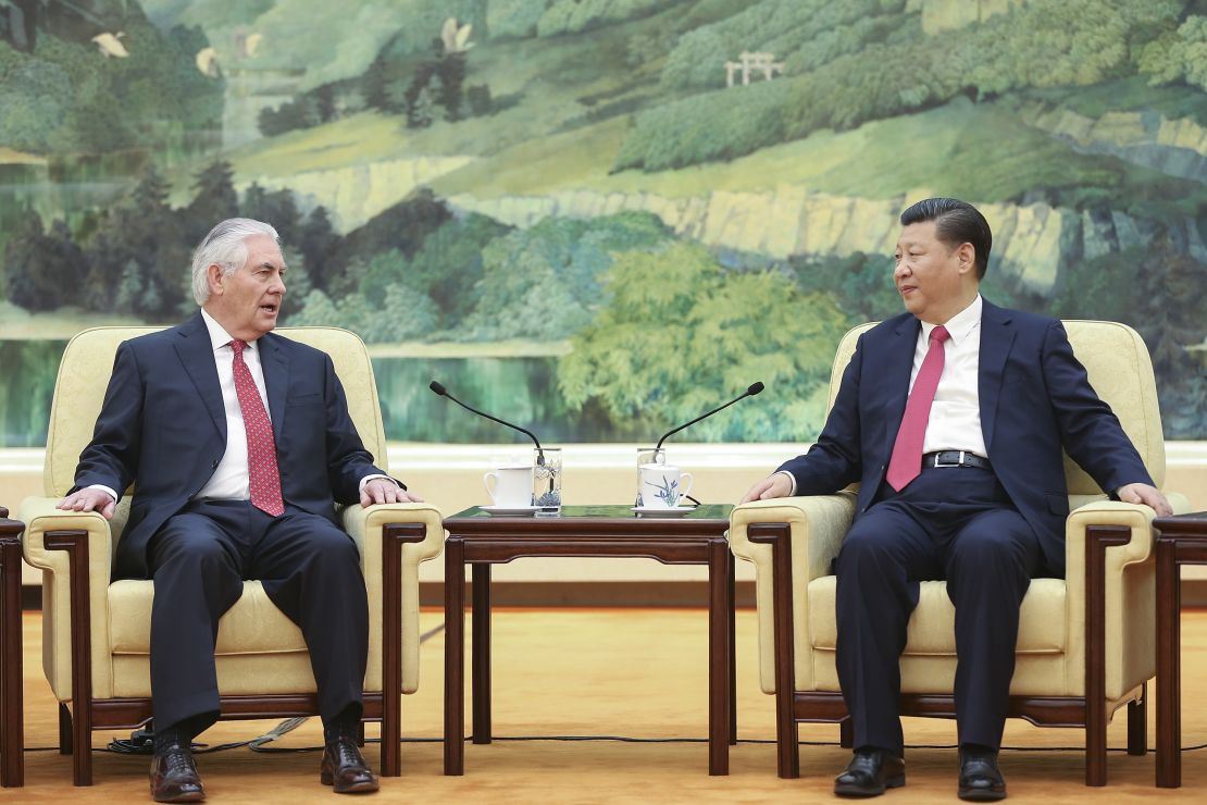 Xi (R) meets with US Secretary of State Rex Tillerson (L) in Beijing on March 19.
