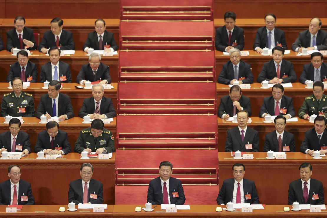 President Xi Jinping (center) attends the 12th National People's Congress (NPC) on March 15 in Beijing, China.