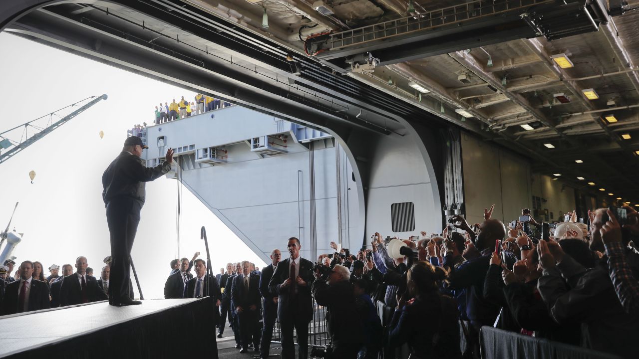 US President Donald Trump waves to Navy sailors and civilian shipbuilders aboard the USS Gerald R. Ford on Thursday, March 2. The ship is still under construction in Newport News, Virginia. During his speech, Trump said his planned <a href="http://www.cnn.com/2017/03/02/politics/donald-trump-aircraft-carrier-defense-funding/" target="_blank">$84 billion increase</a> in the defense budget would be "one of the largest spending increases in US history" and would result in a "major expansion of our entire Navy fleet."