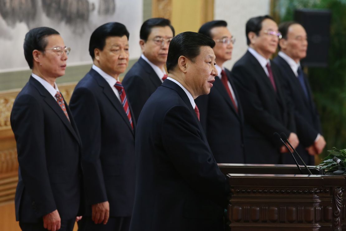 Zhang Gaoli (L) stands with the other six members of the Chinese Communist Party's Politburo Standing Committee inside the Great Hall of the People in Beijing on November 15, 2012.