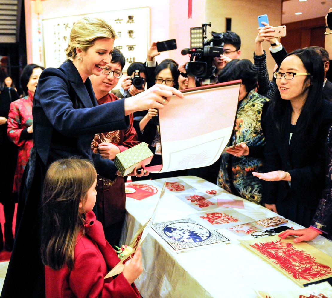 Ivanka Trump, left,  the Chinese Embassy's New Year reception with her daughter on February, 1.