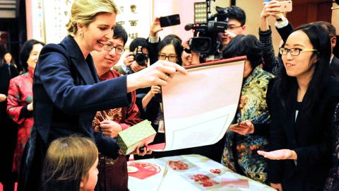 Ivanka Trump, left, the Chinese Embassy's New Year reception with her daughter on February, 1.