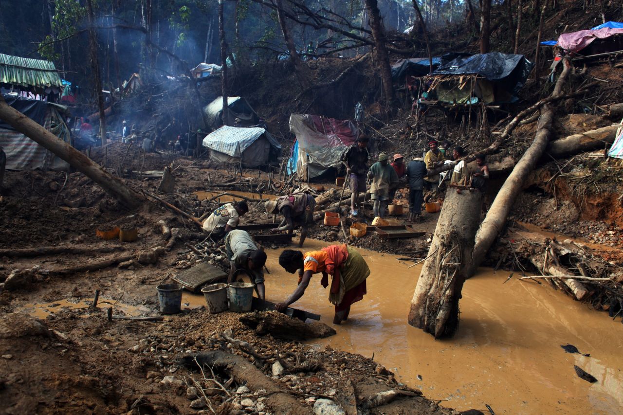 Miners at work in a sapphire mine in the region of Didy in the natural reserve Ankeniheny-Zahamena. In a country where over  70% of the population earn less than $1.90 a day, the mining industry has a powerful allure. 