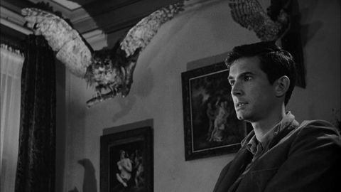 Anthony Perkins plays Norman Bates, a knife-wielding serial killer, in Alfred Hitchcock's "Psycho."