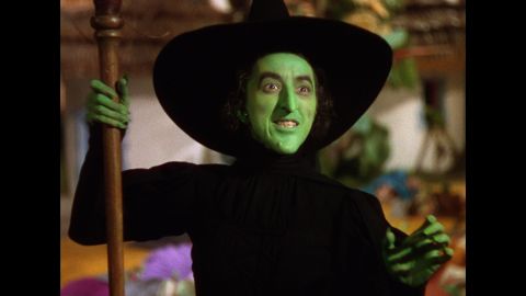 In "The Wizard of Oz," the Wicked Witch of the West, played by Margaret Hamilton, vows to take revenge on Dorothy after her house kills a fellow witch.