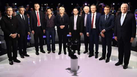 Ten of the 11 candidates in the French presidential election pose for a group photo at the debate. 
