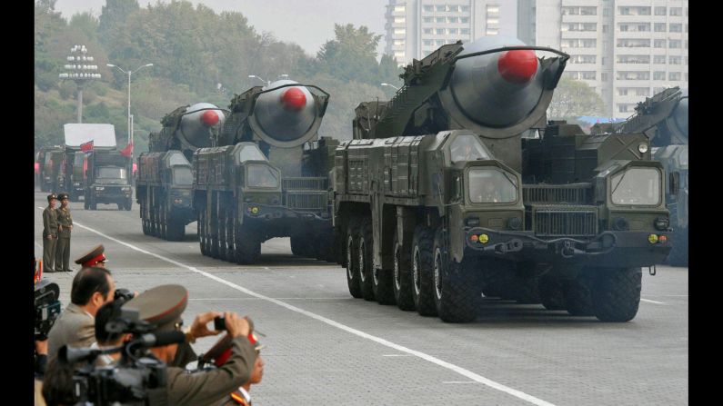 Trucks transport what appear to be North Korea's Musudan intermediate-range ballistic missiles at a military parade in Pyongyang on October 10, 2010.