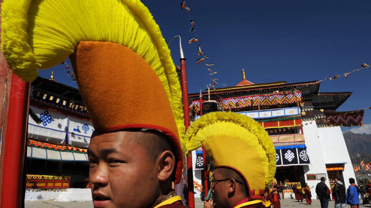 Monks wearing ceremonial headgear at Tawang Monastery.