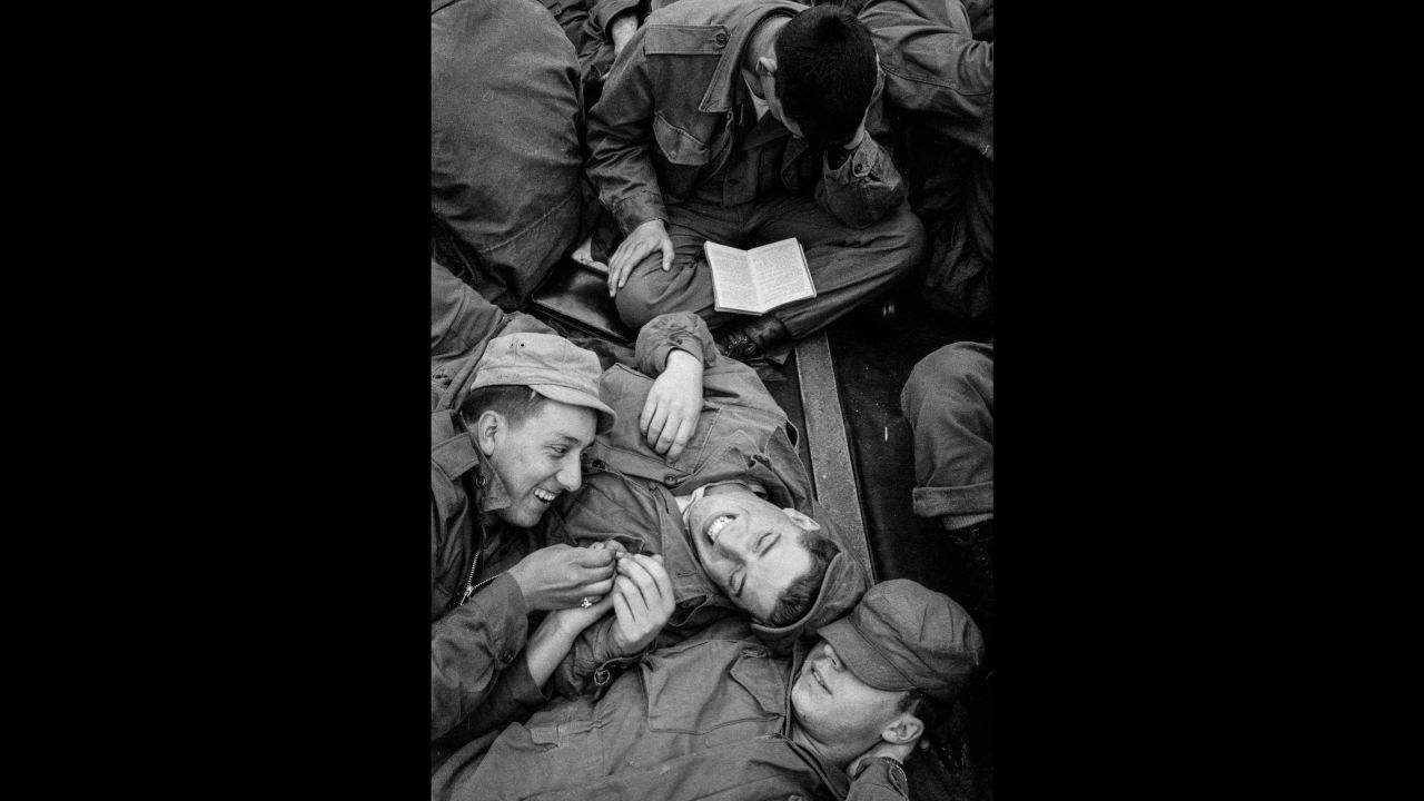 US soldiers pass the time aboard a crowded troopship in 1952. "Contagious Optimism" is the name of the Feinstein exhibit at Bigaignon's gallery. It is just the first part of a Feinstein retrospective that will continue over the next few years, he said.