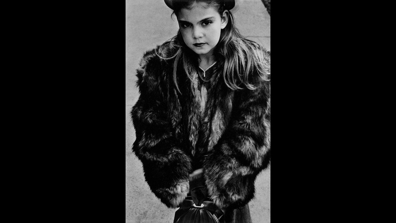 A girl wears a fur coat in New York in 1950.