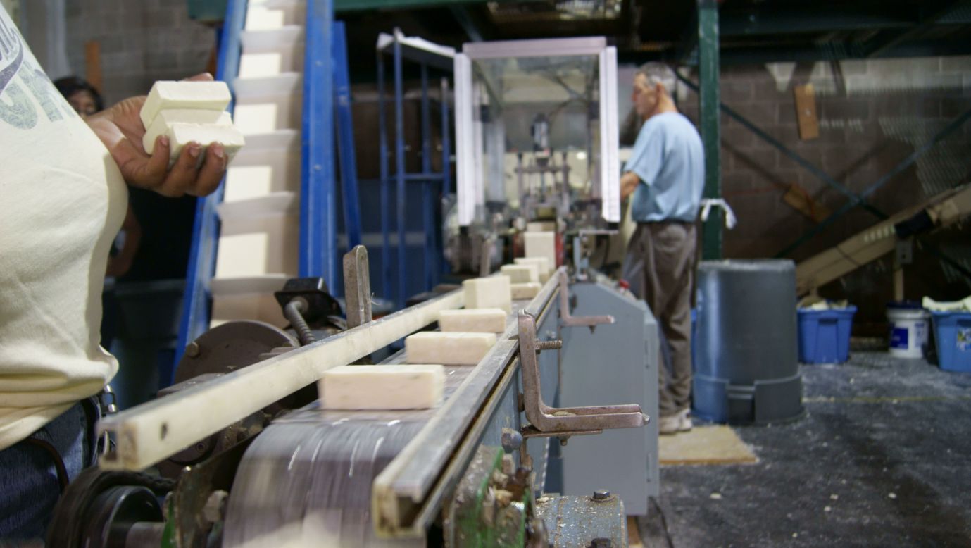 Freshly recycled soap rolls off the line at Clean the World's Orlando recycling center.