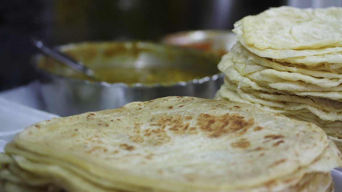 Stack of snacks: Roti flat breads at Central Market