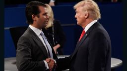 ST LOUIS, MO - OCTOBER 09:  Donald Trump, Jr. (L) greets his father Republican presidential nominee Donald Trump during the town hall debate at Washington University on October 9, 2016 in St Louis, Missouri. This is the second of three presidential debates scheduled prior to the November 8th election.  (Photo by Saul Loeb-Pool/Getty Images)