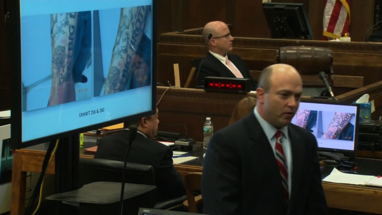 Prosecutor Patrick Haggan shows the jury Aaron Hernandez's tattoos during his double-murder trial.