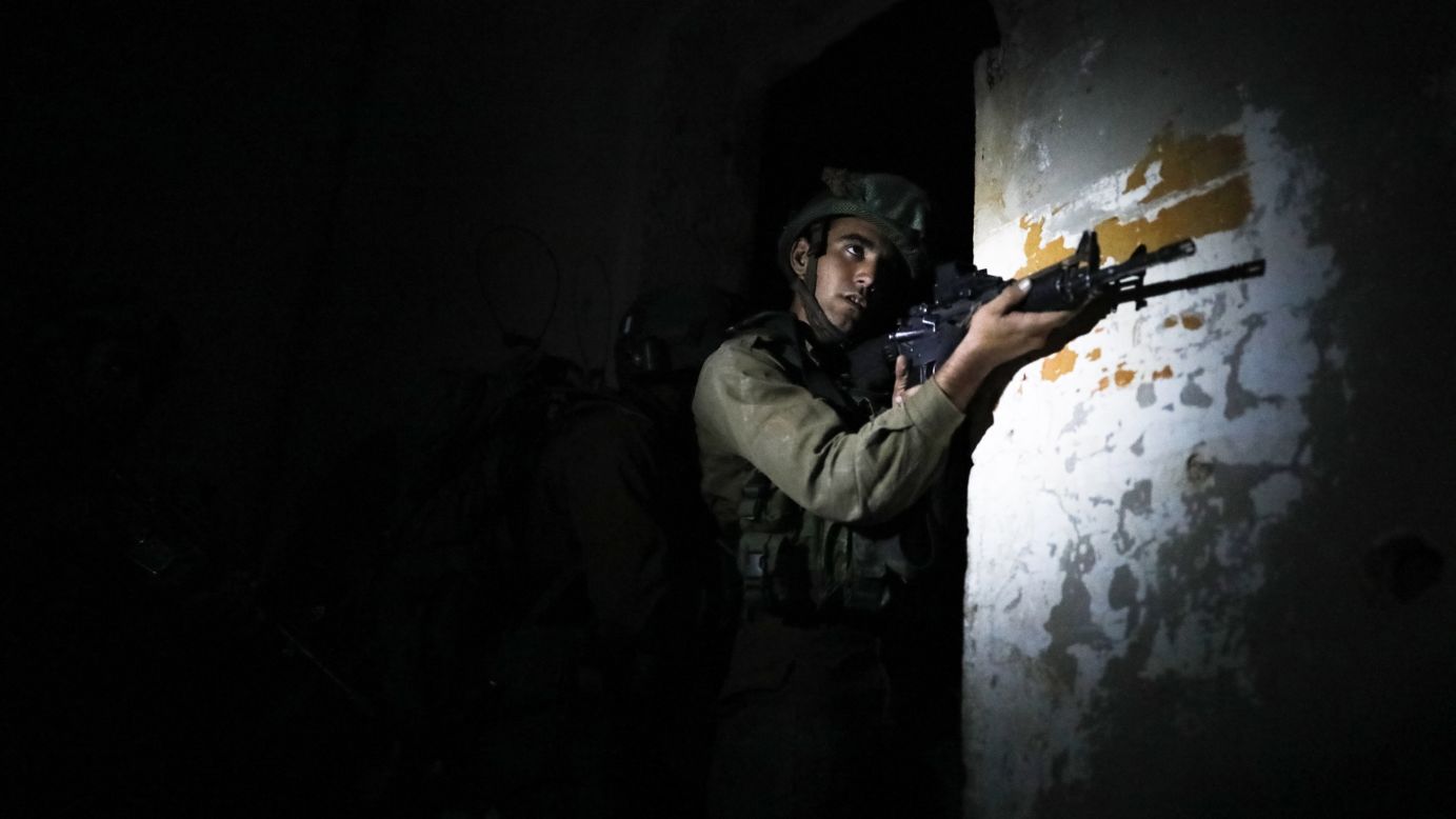 An Israeli soldier takes part in an urban-warfare drill at an abandoned building in the Jordan Valley on Wednesday, April 5.