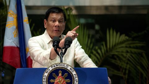 Philippine President Rodrigo Duterte gestures as he answers questions from the press at Manila International Airport on March 23, 2017.
Duterte warned he may impose martial law and suspend elections for tens of thousands of local posts, fuelling concerns about democracy under his rule. Duterte said he was considering both measures as part of his controversial campaign to eradicate illegal drugs in society, and that martial law would also solve a range of other security threats. / AFP PHOTO / NOEL CELIS (Photo credit should read NOEL CELIS/AFP/Getty Images)