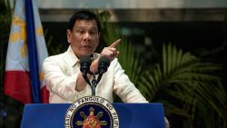Philippine President Rodrigo Duterte gestures as he answers questions from the press at Manila International Airport on March 23, 2017.  
Duterte warned he may impose martial law and suspend elections for tens of thousands of local posts, fuelling concerns about democracy under his rule. Duterte said he was considering both measures as part of his controversial campaign to eradicate illegal drugs in society, and that martial law would also solve a range of other security threats. / AFP PHOTO / NOEL CELIS        (Photo credit should read NOEL CELIS/AFP/Getty Images)