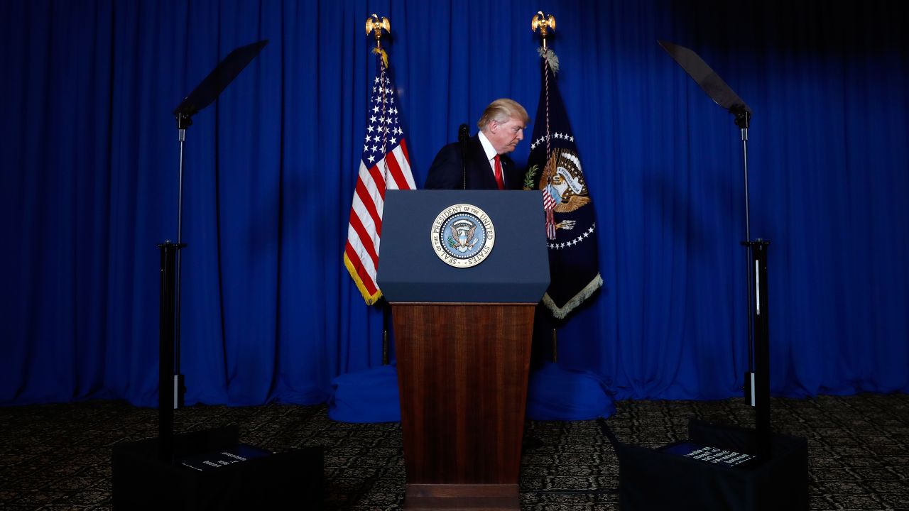 President Donald Trump walks from the podium after speaking at Mar-a-Lago in Palm Beach, Fla., Thursday, April 6, 2017, after the U.S. fired a barrage of cruise missiles into Syria Thursday night in retaliation for this week's gruesome chemical weapons attack against civilians. (AP Photo/Alex Brandon)