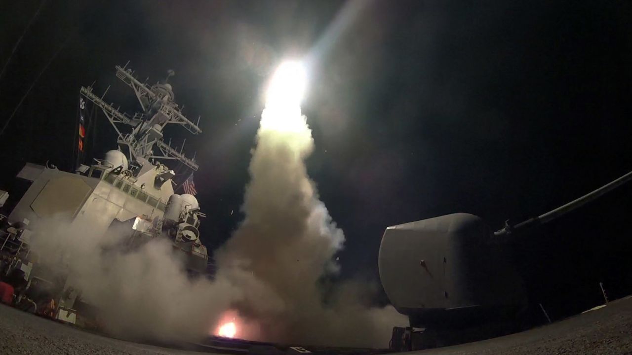 In this image provided by the U.S. Navy, the guided-missile destroyer USS Porter (DDG 78) launches a tomahawk land attack missile in the Mediterranean Sea, Friday, April 7, 2017. The United States blasted a Syrian air base with a barrage of cruise missiles in fiery retaliation for this week's gruesome chemical weapons attack against civilians.  (Mass Communication Specialist 3rd Class Ford Williams/U.S. Navy via AP)