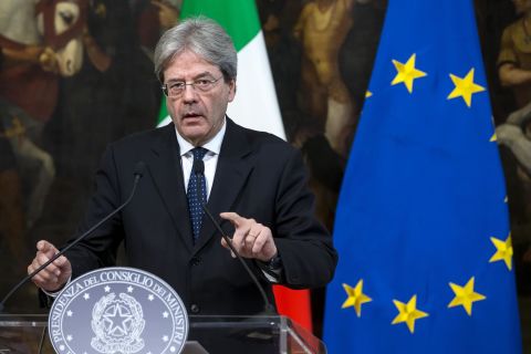 Italian Prime Minister Paolo Gentiloni speaks at a news conference in Rome. The country's foreign minister, Angelino Alfano, said in a statement that the US military action in Syria was "proportionate and well-timed."