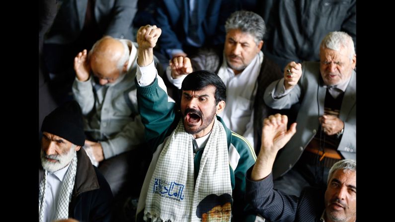 Iranians shout anti-US slogans after a Friday prayer ceremony in Tehran, following a US airstrike in Syria. Iranian Foreign Ministry spokesman Bahram Qasemi said Iran "strongly condemns" President Trump's military strike against the Syrian government, according to Iran's semi-official news agency ISNA. Iran also "condemns any use of chemical weapons no matter who uses it or who the victims are," he said.