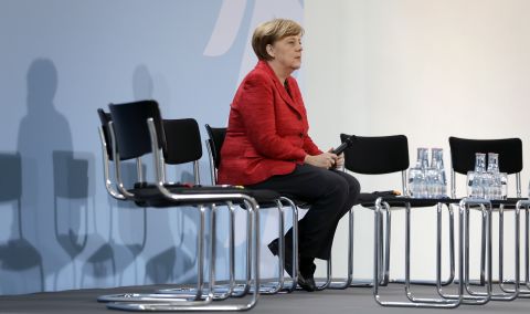 German Chancellor Angela Merkel attends a refugee relief panel at an event honoring volunteers in Berlin. In a statement Friday Merkel said, "This attack by the United States of America is understandable, given the aspect of the war crimes, given the suffering of innocent people and given the logjam in the UN Security Council."