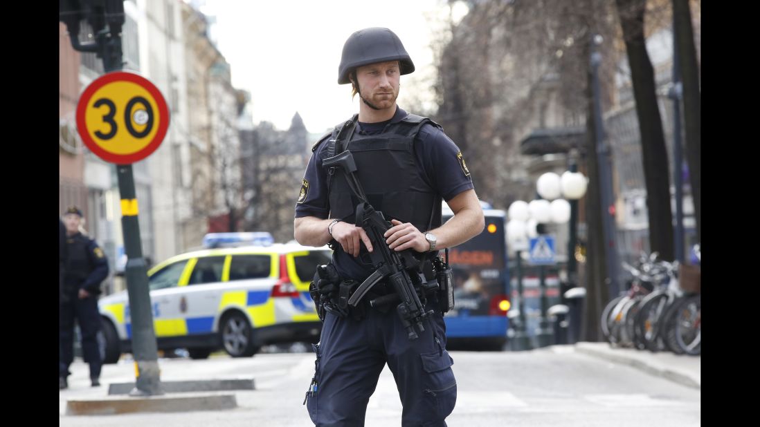A police officer stands guard near the scene of the attack.