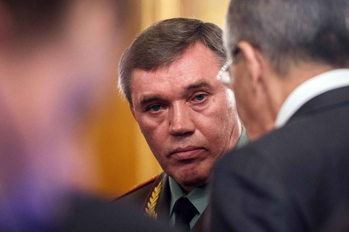 Gen. Valery Gerasimov (C), chief of the Russian General Staff, speaks to Foreign Minister Russian Foreign Minister Sergei Lavrov in this 2016 file photo.