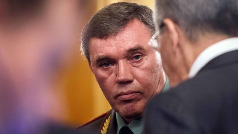 Gen. Valery Gerasimov (C), chief of the Russian General Staff,  speaks to Foreign Minister Russian Foreign Minister Sergei Lavrov in this 2016 file photo.
