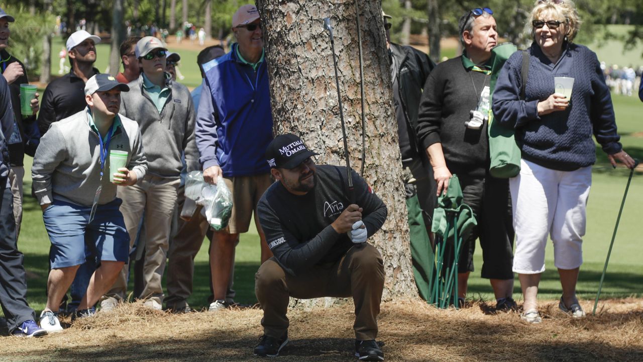 Ryan Moore watches a shot from the pine straw on the 17th hole.