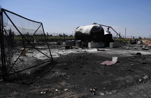 The ground is blackened at the Shayrat airfield. A statement from Syria's general military command said the strikes caused "extensive material damage" and undermined counterterror operations by the Syrian army. 
