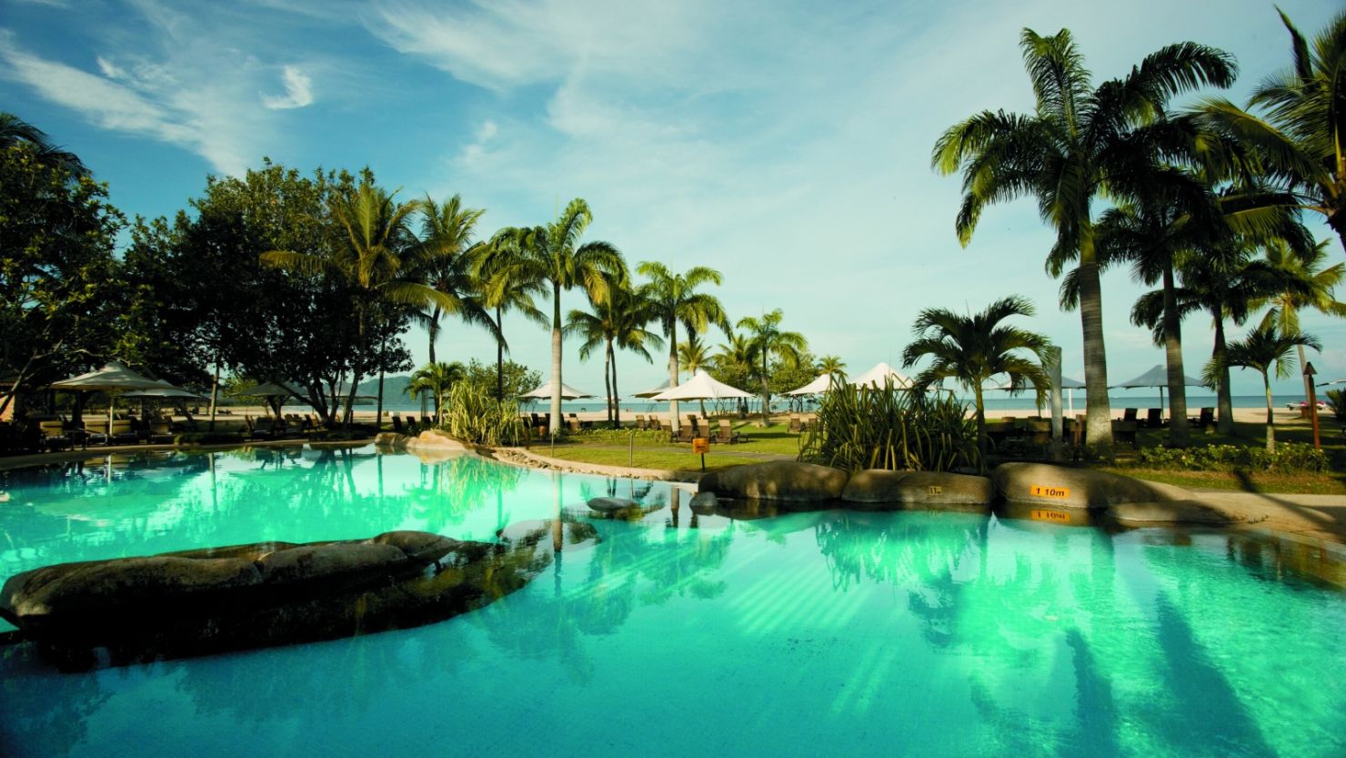 The Shangri La Rasa Ria -- palm fronds, pool and plenty of pale sand.