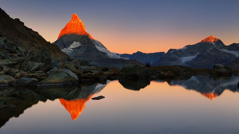 The Matterhorn in the Swiss/Italian Alps is reflected in Riffelsee Lake in Switzerland.